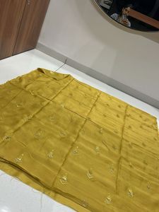 Elegant Yellow Embroidered material use to dresse