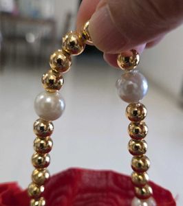 Red Potli Bag with Gold Embellishments