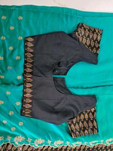Beautiful Teal Saree with Embroidered Border