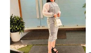 black white mid length dress