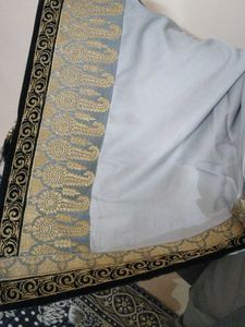 Elegant Grey Saree with Gold Border