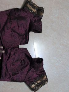 Elegant Purple Saree with Intricate Patterns
