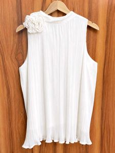 Chic White Sleeveless Top with Floral Detail