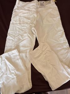 Cream Distressed Wide-Leg Jeans