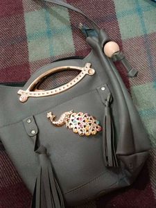 Stylish Grey Handbag with Embellishments