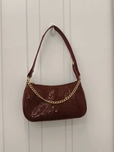 Chic Burgundy Shoulder Bag with Gold Chain