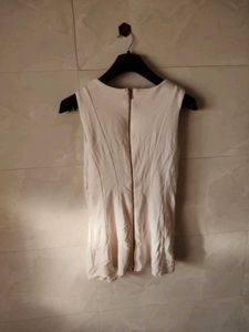 White Sleeveless Top
