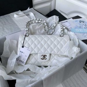 Chanel Classic Flap Bag - Black Lambskin