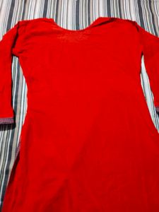 Vibrant Red Kurta with Intricate Neckline