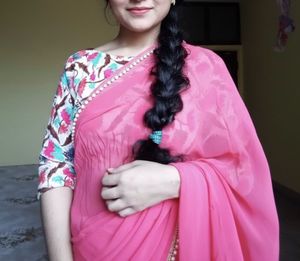 Elegant Pink Saree with Pearl Detailing