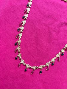 Lightweight gold and crystals Necklace.
