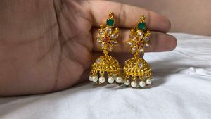 Elegant Gold Jhumka Earrings with Pearls