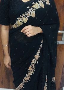 Elegant Black Saree with Floral Border