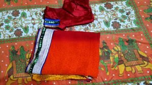 Red Saree with Embellished Blouse