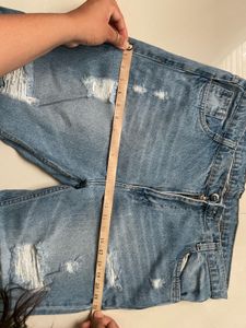 Distressed Blue Denim Jeans