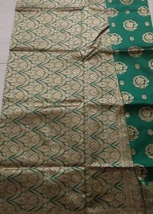91)Elegant Emerald Green Silk Saree