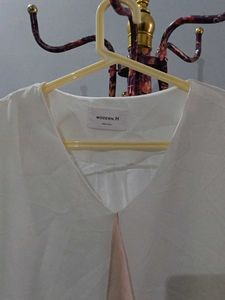 Elegant White V-Neck Blouse with Bell Sleeves