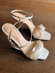 Elegant White Heeled Sandals