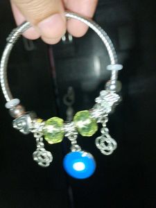 Charming Charm Bracelet with Yellow Beads