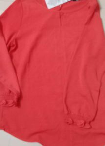 Coral Long Sleeve Top with Ruffled Cuffs