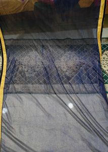 Elegant Royal blue net saree golden embroidery