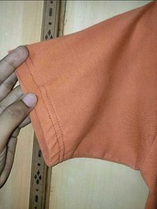 Orange Polo T-Shirt by Logic Goods and Garments