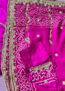 Stunning Magenta Bandhani Lehenga Choli