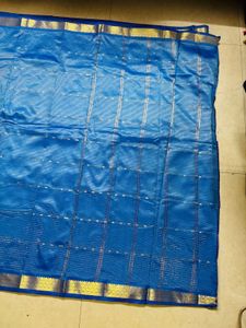 Stunning Blue Silk Saree with Gold Border