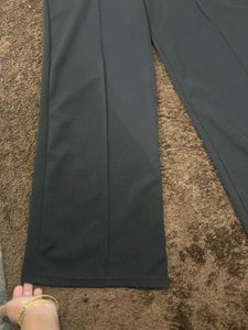 Stylish Wide-Legged Pants with Gold Chain Detail