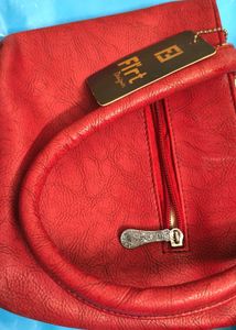 Maroon small handbag