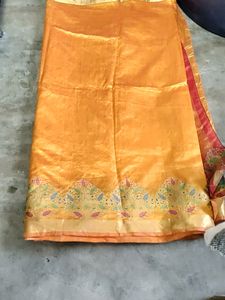 Elegant Orange Silk Saree with Floral Border