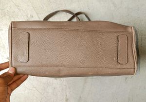 brand is bruno magli OG Stylish Taupe Faux Leather