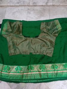 new green saree with contrast blouse