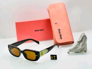 MIU MI Tortoiseshell Sunglasse