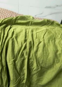 Green shirt with embroidery