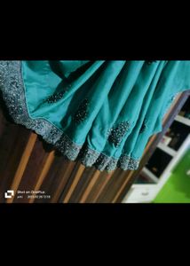 Elegant Teal Saree with Embellished Blouse