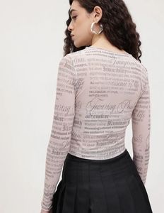 Sheer Mesh Graphic Print Long Sleeve Top