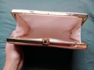 Elegant Rose Embossed Rosegold Clutch Bag