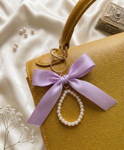 Elegant Pearl &amp; Bow Keychain Charm