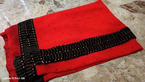 Elegant Red Saree with Black Embellished Border