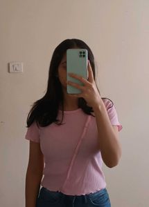 pink ribbed button-up crop top