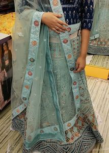 Exquisite Teal Embroidered Lehenga Choli