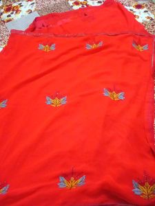 Vibrant Red Saree with Leaf Motifs