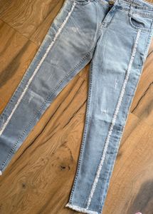 Light Wash Distressed Denim Jeans