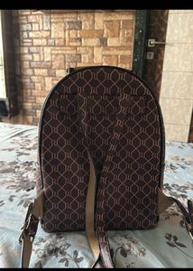 River Island Monogram Backpack