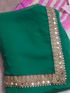Elegant Green Saree with Mirror Work Border