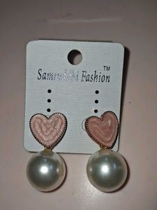 Heart shaped earing pink