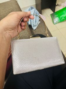 green saree with Clutch Bag