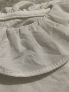 girls white ruffle top