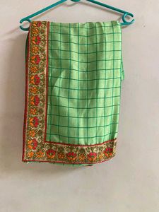 Elegant Green Checked Saree with Floral Border